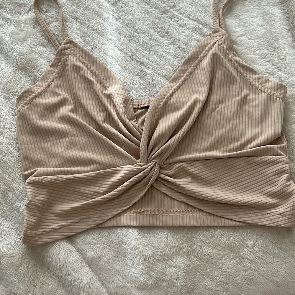 Jeans size, small tan tie, crop top tank